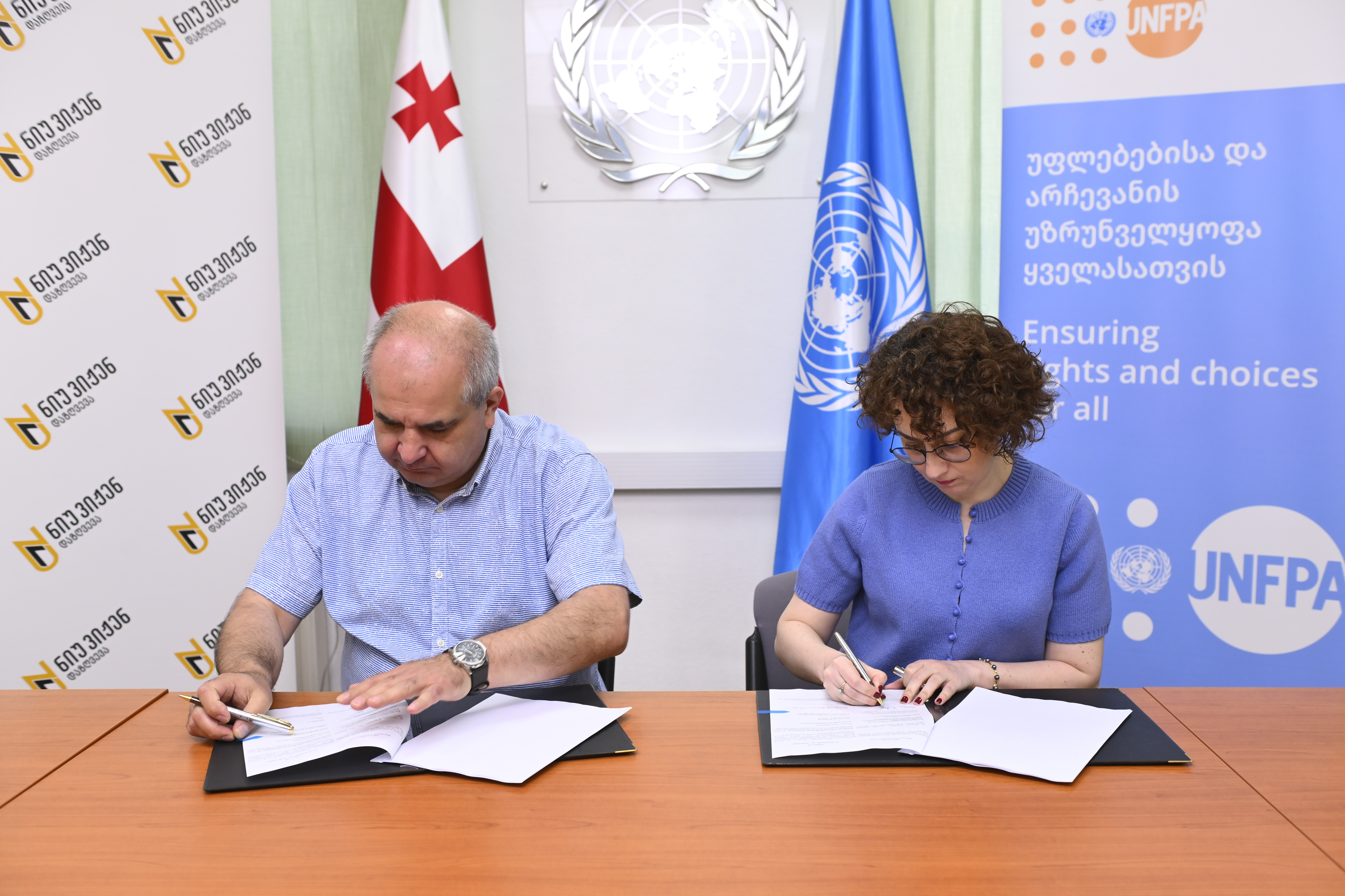 Medical Director of New Vision Insurance and Head of UNFPA Georgia Country Office sign memorandum