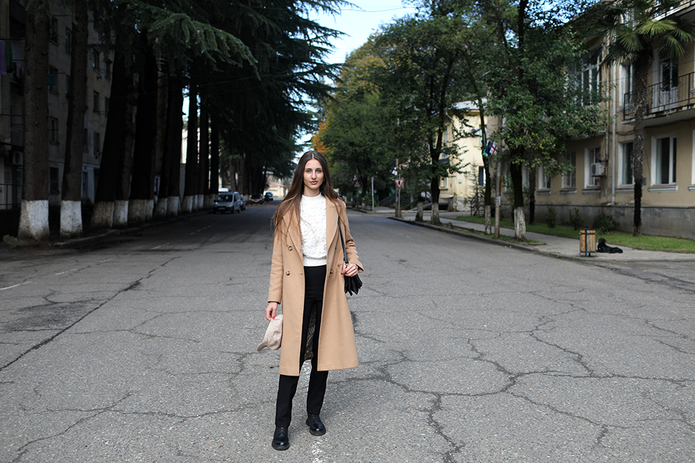 Ana Datiashvili standing in the middle of a street in Zestafoni