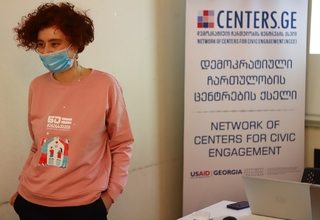 Doctor Tinatin Gagua wearing UNFPA campaign shirt