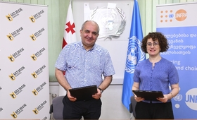 Medical Director of New Vision Insurance and Head of UNFPA Georgia Country Office stand together 