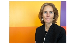 Florence Bauer - the Regional Director for Eastern Europe and Central Asia of UNFPA is standing in front of orange background