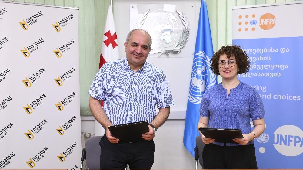 Medical Director of New Vision Insurance and Head of UNFPA Georgia Country Office stand together 