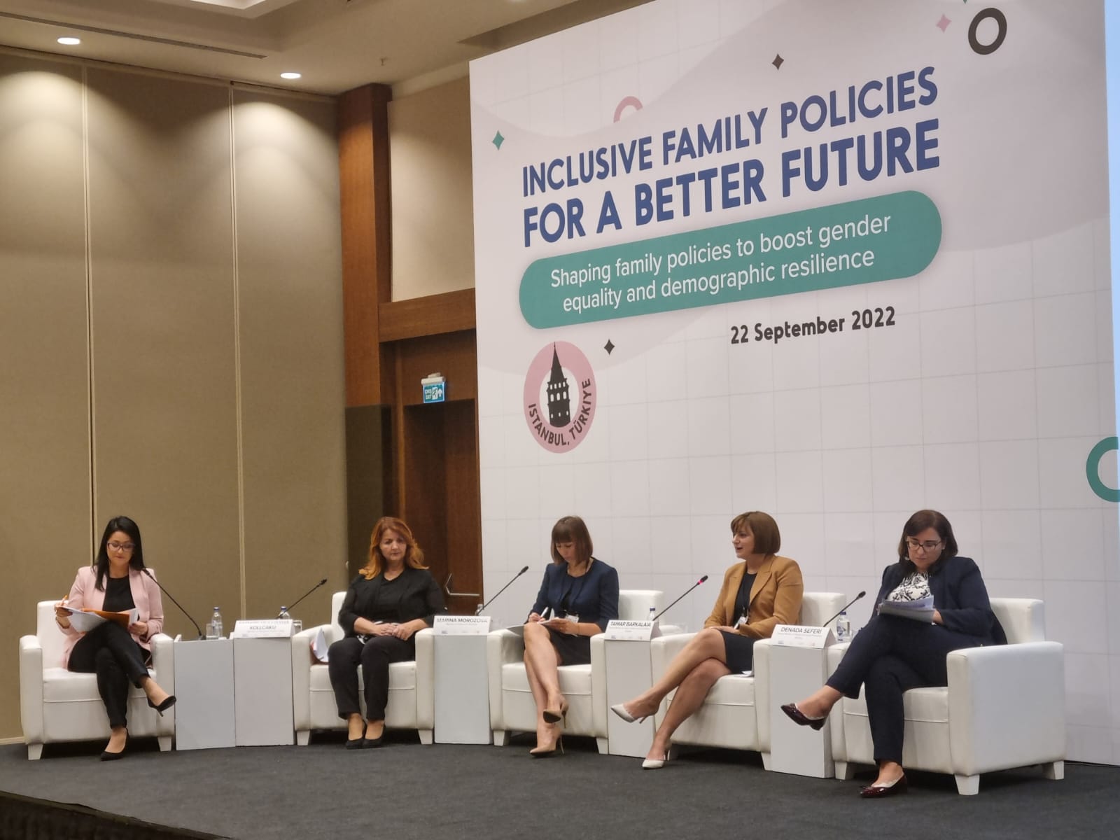 A panel of high-level delegates. All female